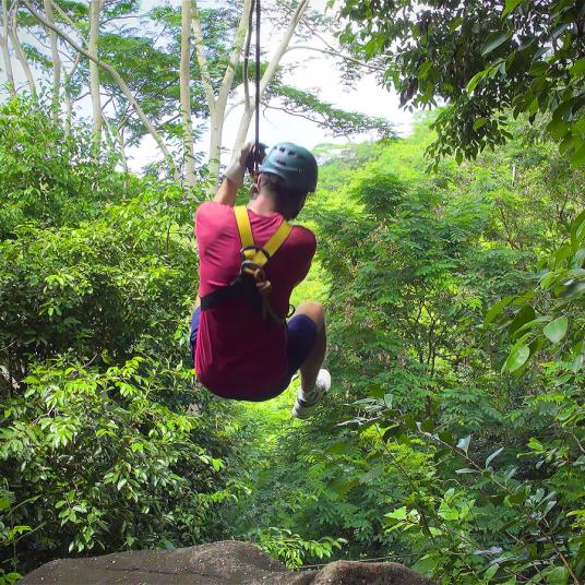 a guy zip lining